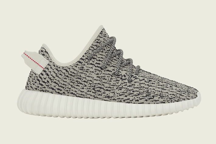 Yeezy Boost 350 sneaker designed by Kanye West, featuring a knitted texture with a thick ribbed sole and pull tab at the heel