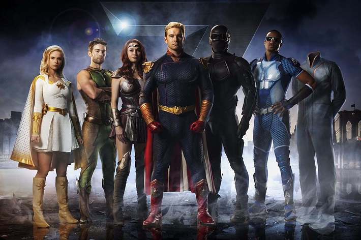 The image shows superhero characters Annie January, Kevin Moskowitz, Queen Maeve, Homelander, Black Noir, and A-Train from the TV show The Boys, standing together