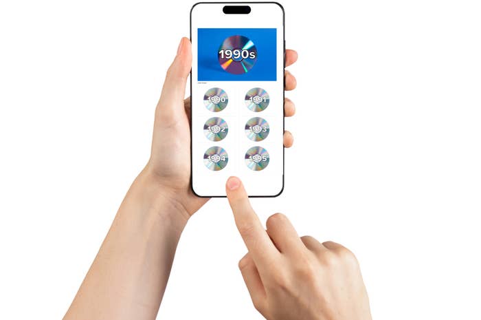 A person holding a phone displaying a retro music app interface featuring selections of years from the 1990s