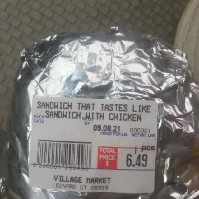 Label on a wrapped item reads: "Sandwich that tastes like sandwich with chicken," priced at $6.49, from Village Market in Ledyard, CT