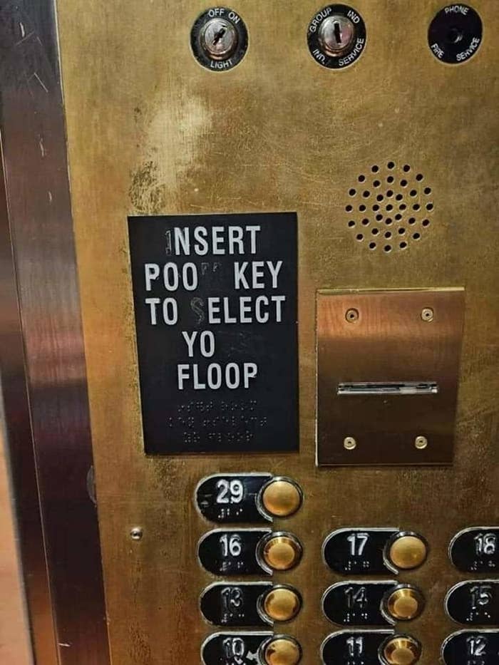 A worn elevator panel with text reading "Insert poop key to select yo floop," showing buttons for floors 1-20 but with numbers 12, 17, 18, and 19 missing