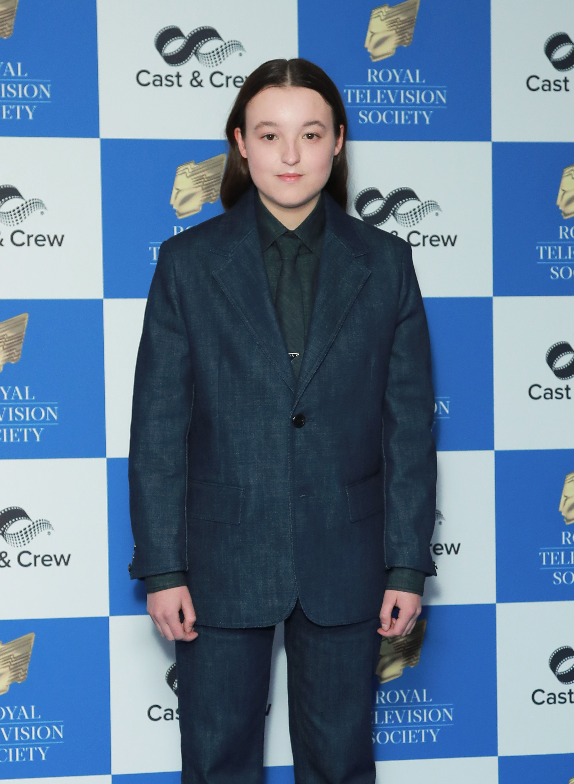 Bella Ramsey in a tailored suit at the Royal Television Society event