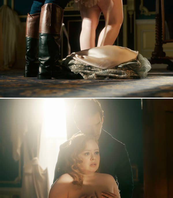 Close-up of boots standing next to a woman&#x27;s legs and clothes on the floor. Colin embraces a worried-looking Penelope in a dimly lit room