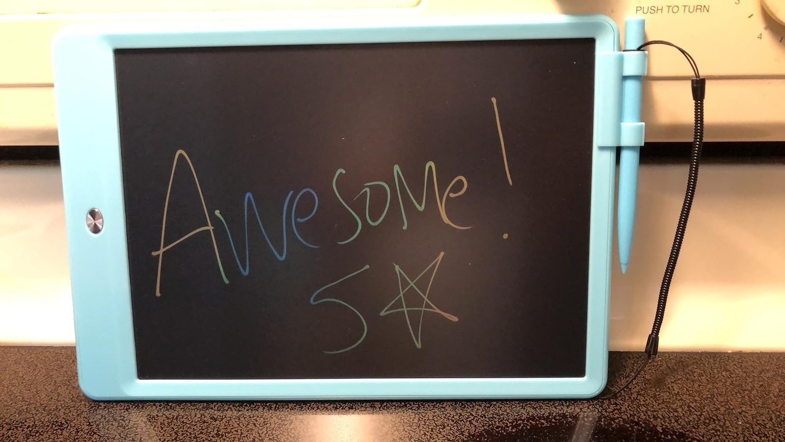 reviewer's LCD tablet with writing on it