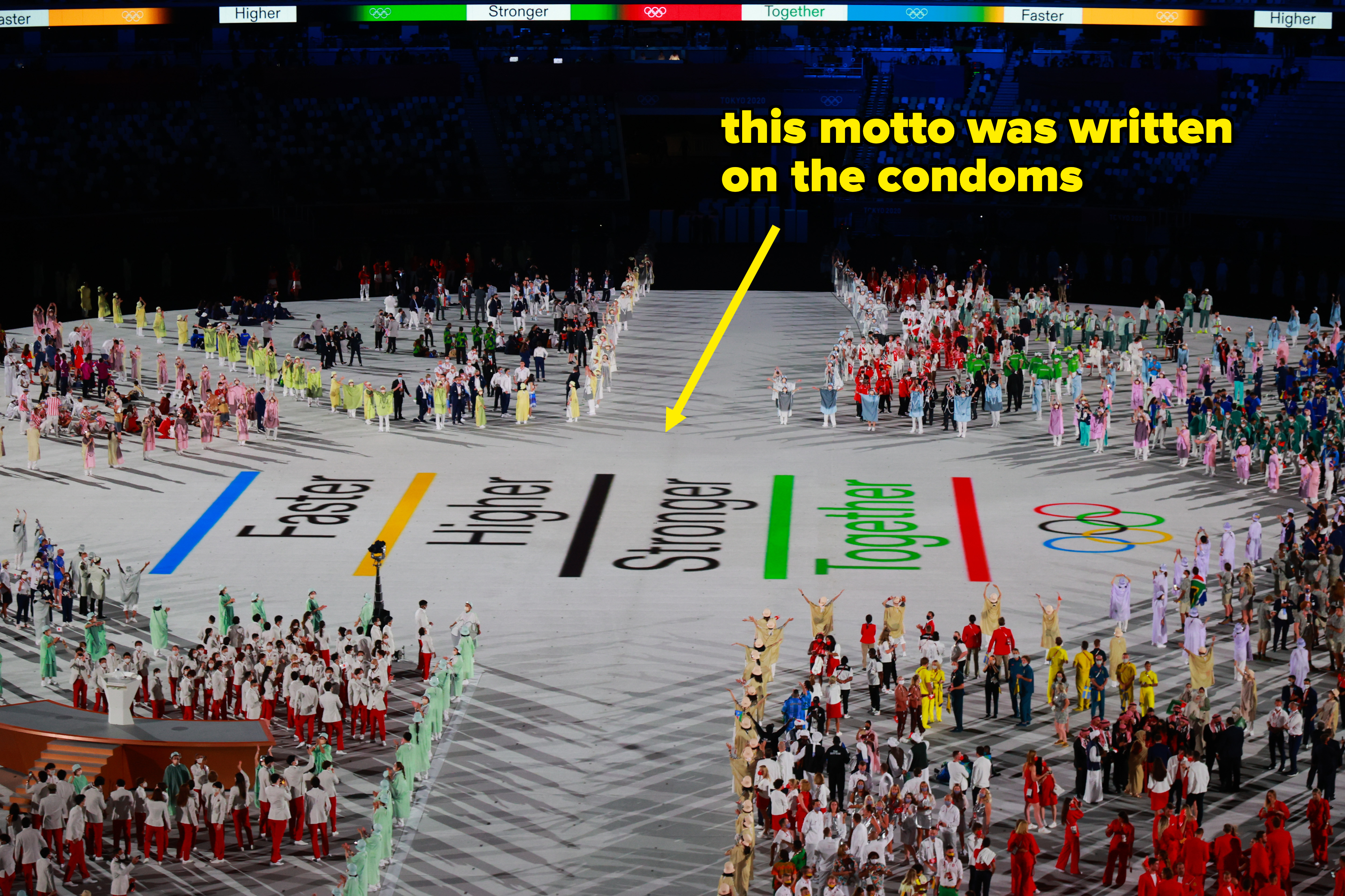 The image shows a large group of athletes on a stadium field during the Olympics opening ceremony, with the words "Faster," "Higher," "Stronger," and "Together."
