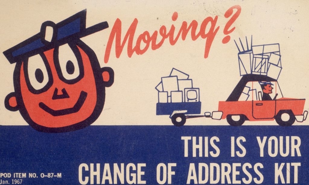 Cartoon of a smiling face and a car towing boxes, with text: "Moving? This is your change of address kit" from January 1967