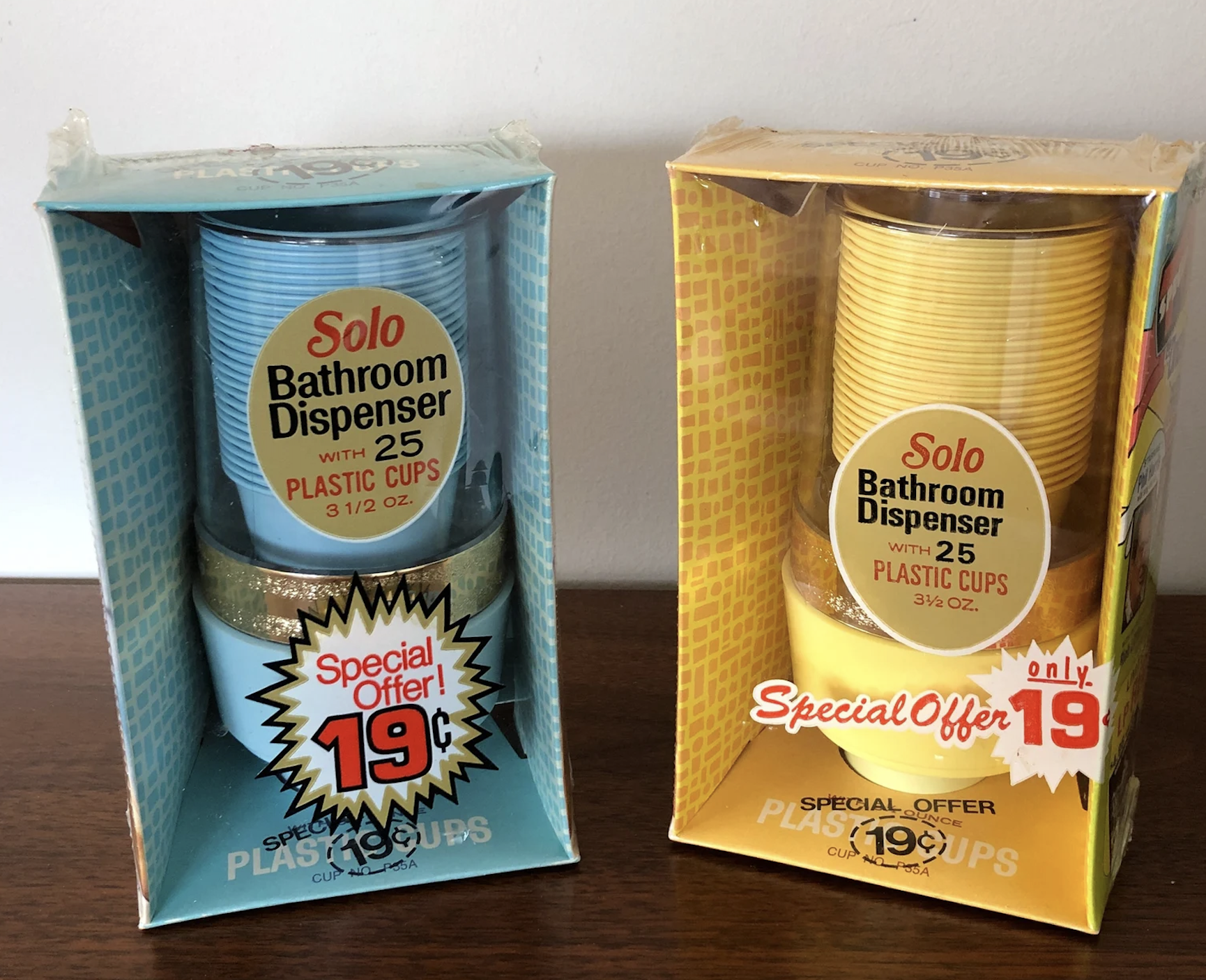 Two packs of Solo Bathroom Dispensers with 25 plastic cups each. Both packs advertise a special offer price of 19 cents
