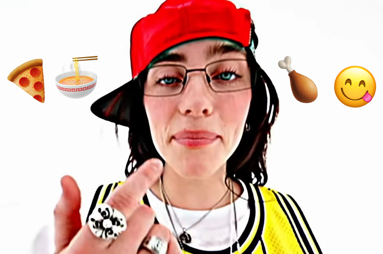 Billie Eilish wearing glasses and a cap, pointing towards the camera. Emoji symbols of pizza, ramen, fried chicken, and a licking face surround her