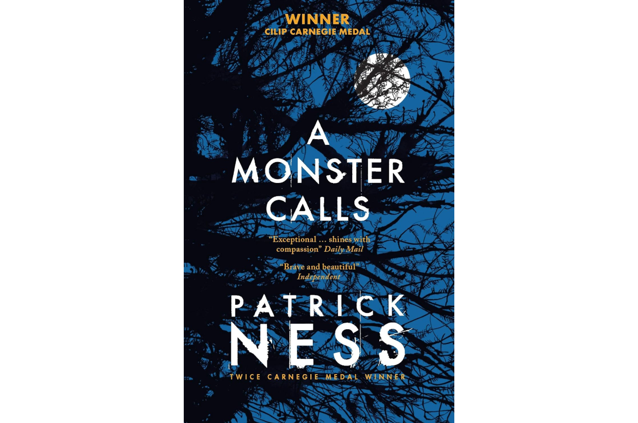 Cover of the book "A Monster Calls" by Patrick Ness, featuring tree branches against a dark sky with a full moon. The book is a winner of the CILIP Carnegie Medal