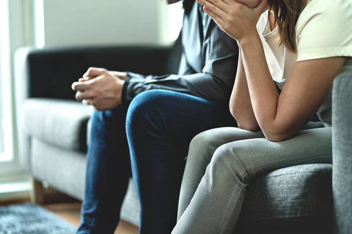 On left, a woman in loungewear sits against the wall, looking at her laptop. On right, Kim Kardashian in casual wear with a concerned expression. Text reads, “He then began showing everyone at the table photos of her Instagram…"