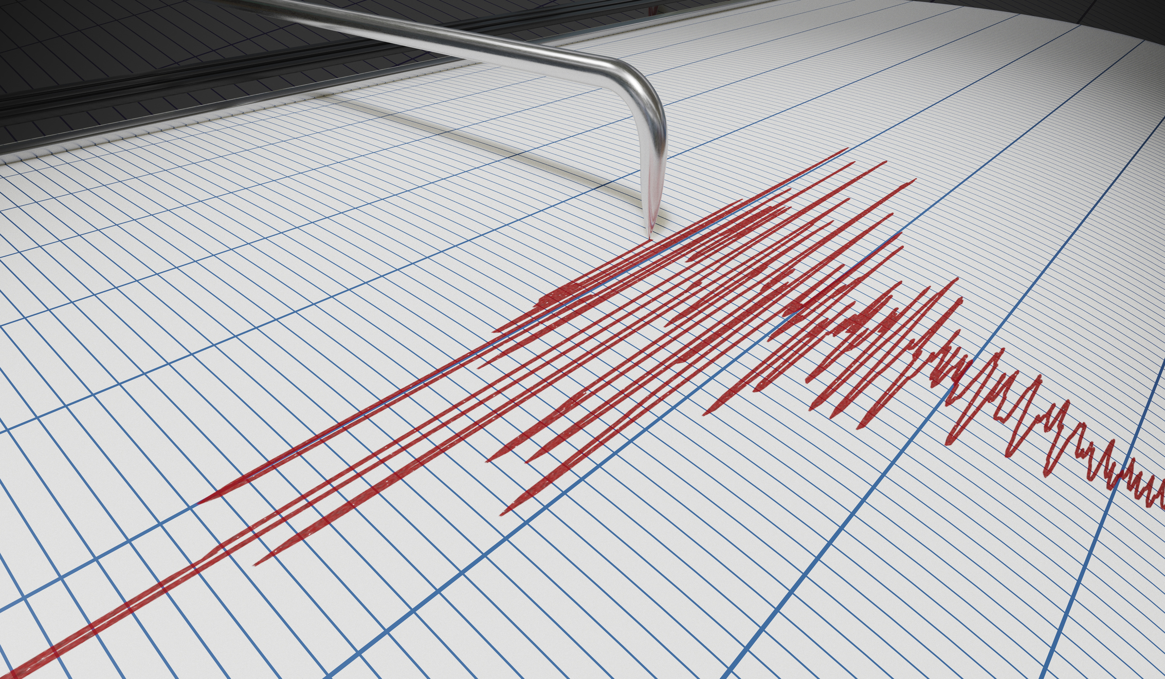 A seismograph records earth tremors with red ink on lined paper, indicating an earthquake