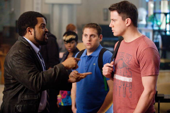 Ice Cube, Jonah Hill, and Channing Tatum in a scene from "21 Jump Street." Ice Cube points while speaking to Jonah Hill and Channing Tatum, who look attentive