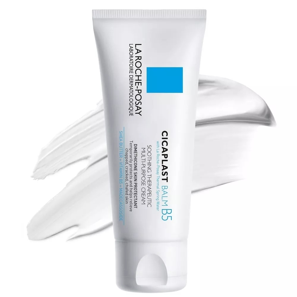 A tube of La Roche-Posay Cicaplast Balm B5 skincare product with text detailing its soothing and repairing properties on a white background