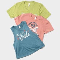 Three graphic T-shirts are displayed, featuring "Team Bride," "Your Group," and another partial text, suitable for party-themed shopping