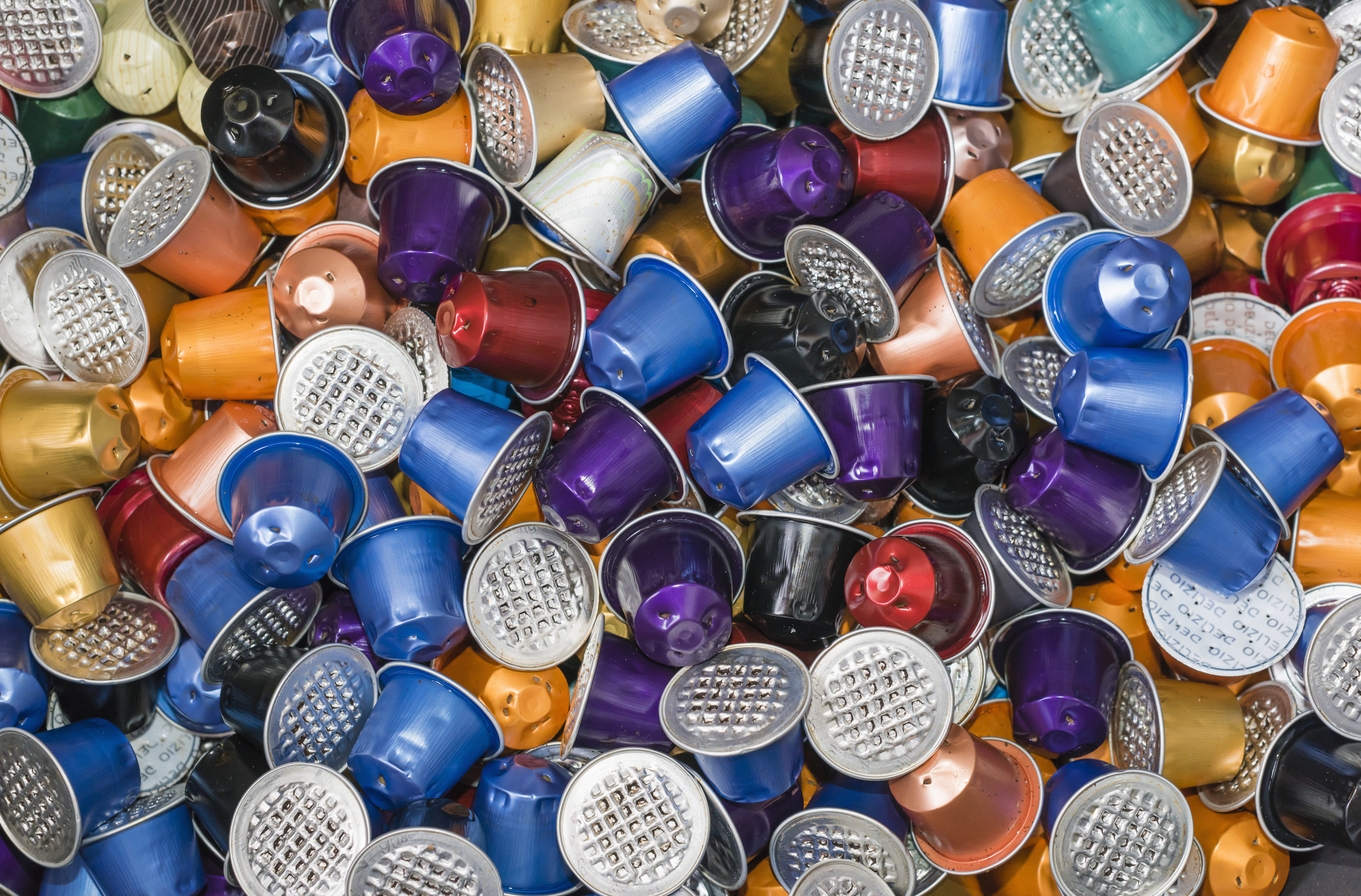 Reusable coffee capsules arranged in a pile