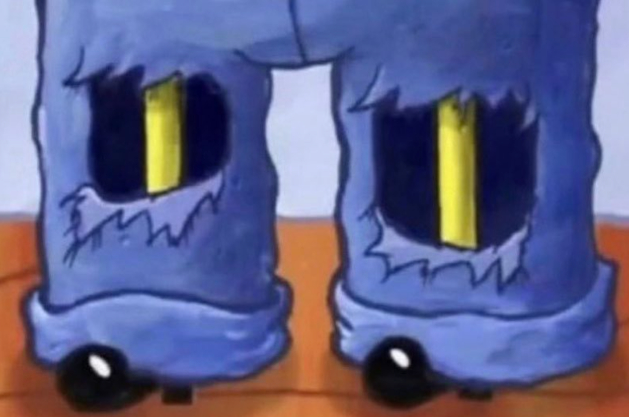 Close-up image of SpongeBob SquarePants' legs, showing his pants with large, rectangular, yellow patches poking through torn holes in the knees