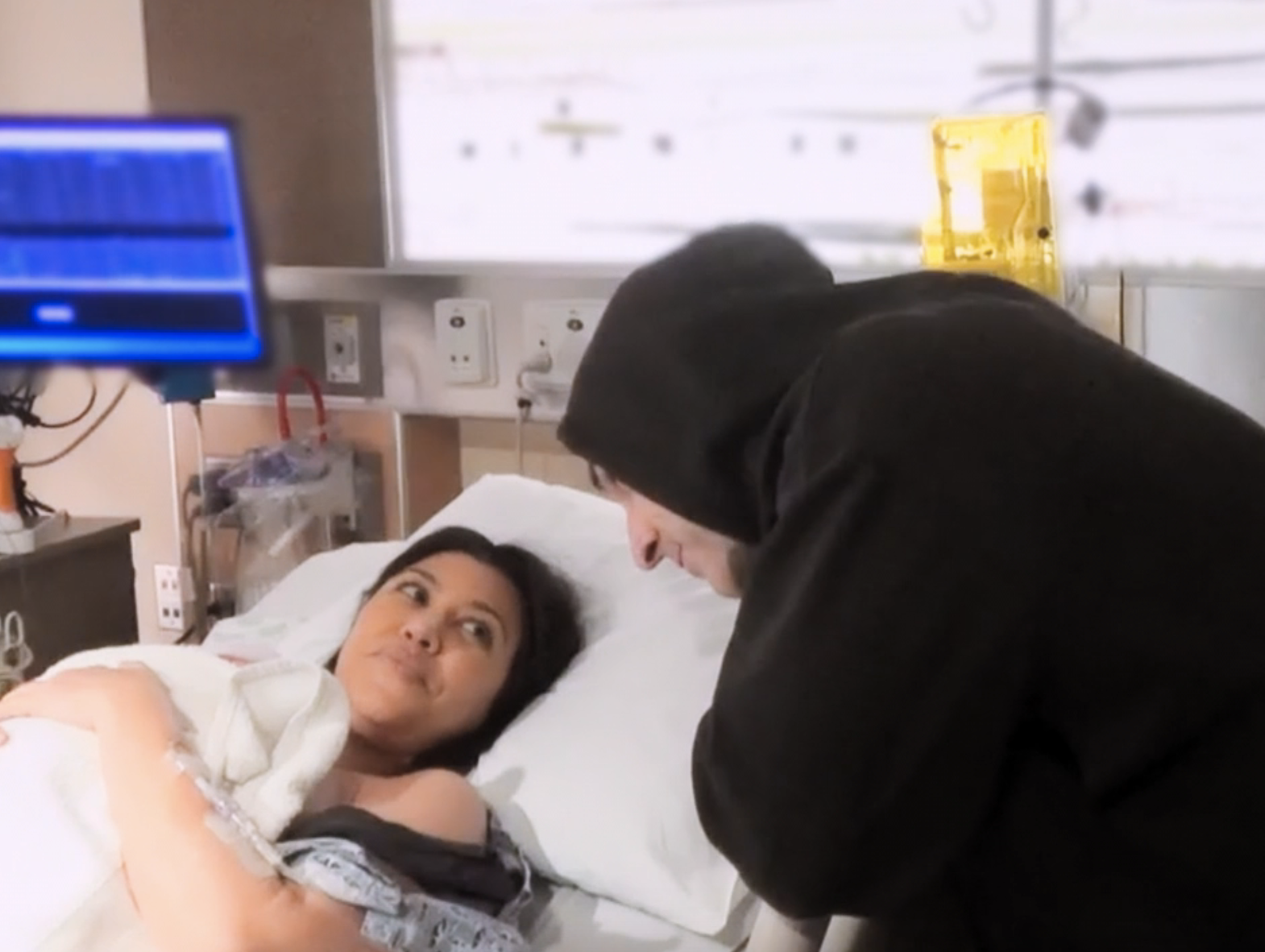 Kourtney Kardashian and Travis Barker in the hospital with their son Rocky