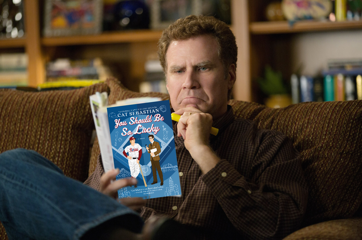 Will Ferrell sits on a couch reading "You Should Be So Lucky" by Cat Sebastian with a thoughtful expression