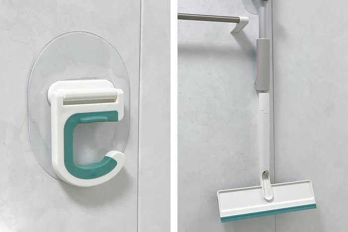 フックが壁に取り付けられており、モップがそこに掛けられています。