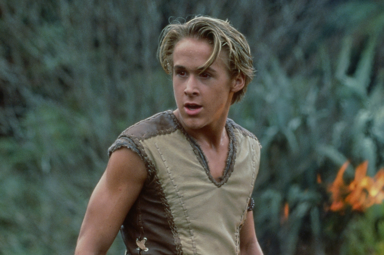 Ryan Gosling in a sleeveless, medieval-style tunic in an outdoor setting