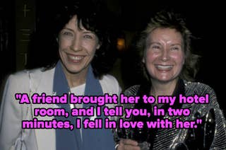 Lily Tomlin and Jane Wagner smiling and holding drinks. Text over the image reads, 