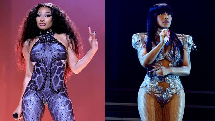 Megan Thee Stallion and Nicki Minaj performing on stage in stylish, form-fitting outfits during a music event. Megan wears a patterned bodysuit, and Cardi wears a silver, embellished costume with tassels