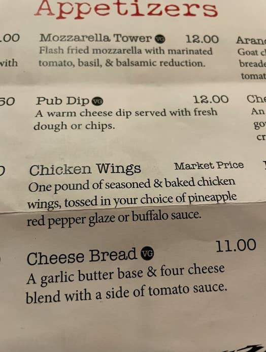 Menu showing appetizers with options: Mozzarella Tower ($12), Pub Dip ($12), Chicken Wings (market price), and Cheese Bread ($11)