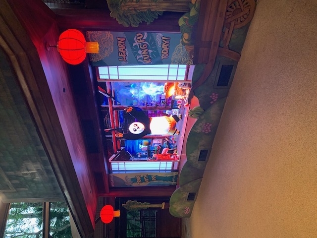 An animated image of Po from Kung Fu Panda, inviting viewers to "Learn Kung Fu Today!" The setting includes traditional Chinese decor and bright red lanterns