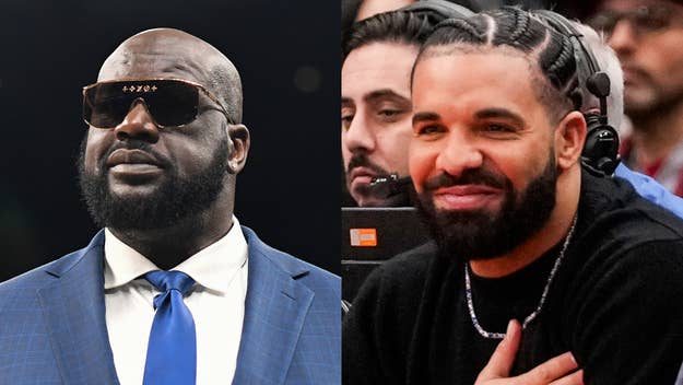 Shaquille O'Neal in a suit and sunglasses beside Drake in casual wear at a sports event