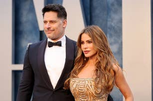 Joe Manganiello in a tuxedo and Sofia Vergara in an embellished gown pose together at a formal event
