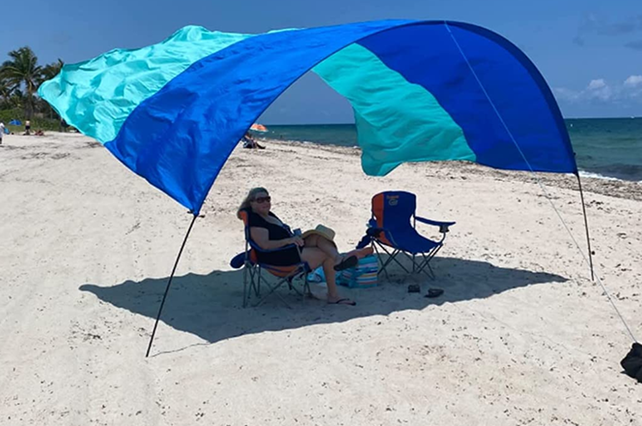 36 Products That’ll Actually Allow You To Enjoy The Beach Without Having To Worry About The Sand, Wind, And More