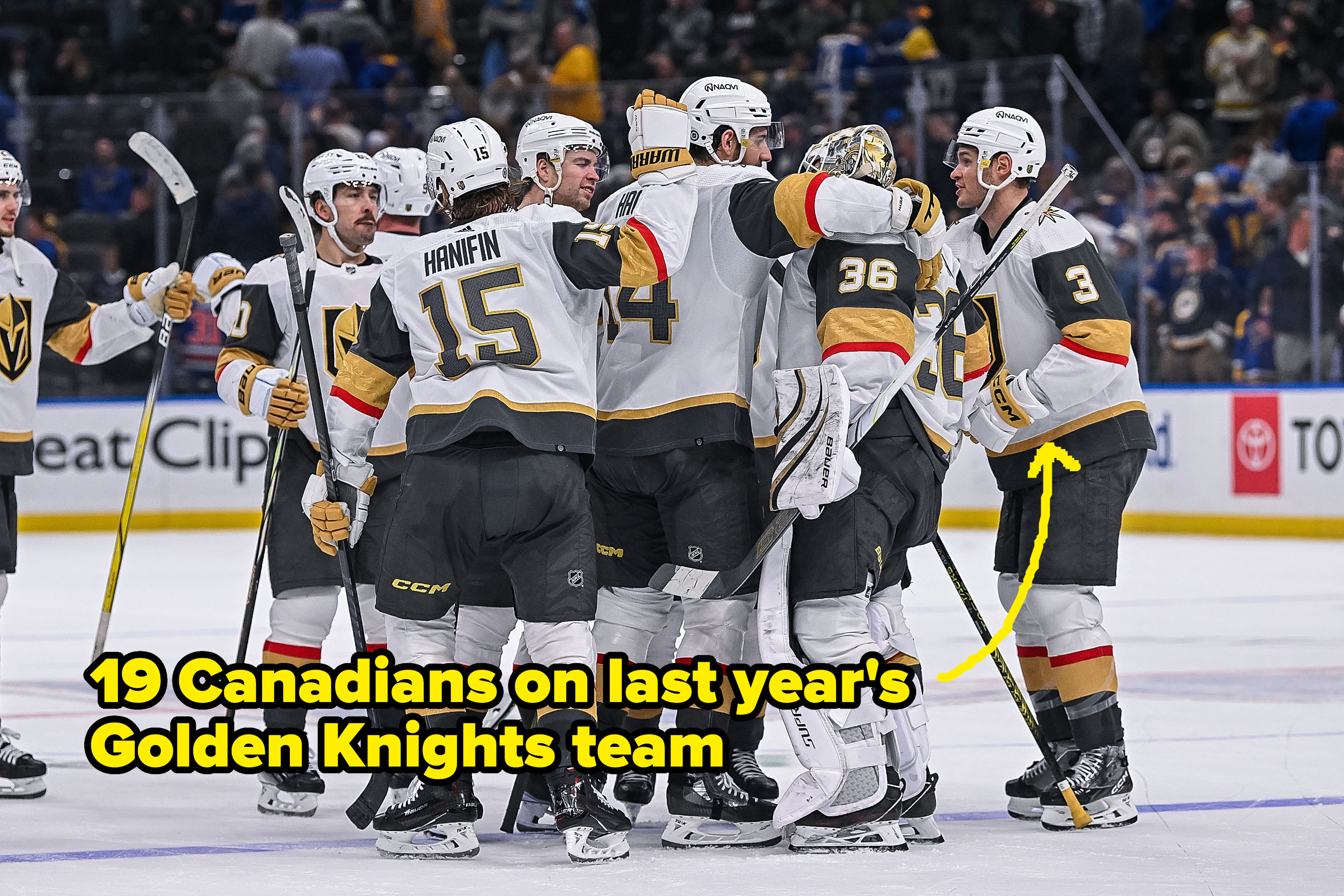 Vegas Golden Knights hockey players in team uniforms gather in a group hug after a game on the ice rink