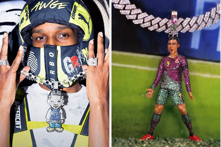 A$AP Rocky poses wearing a face mask and multiple rings, showcasing a large pendant necklace featuring a detailed figurine of himself