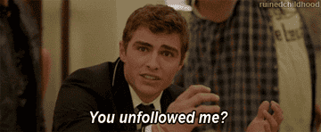 A man in a suit looks concerned and gestures with his hands while saying, "You unfollowed me?"