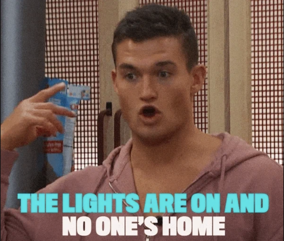 Person in a pink hoodie with a surprised expression and text below: &quot;The lights are on and no one's home.&quot;