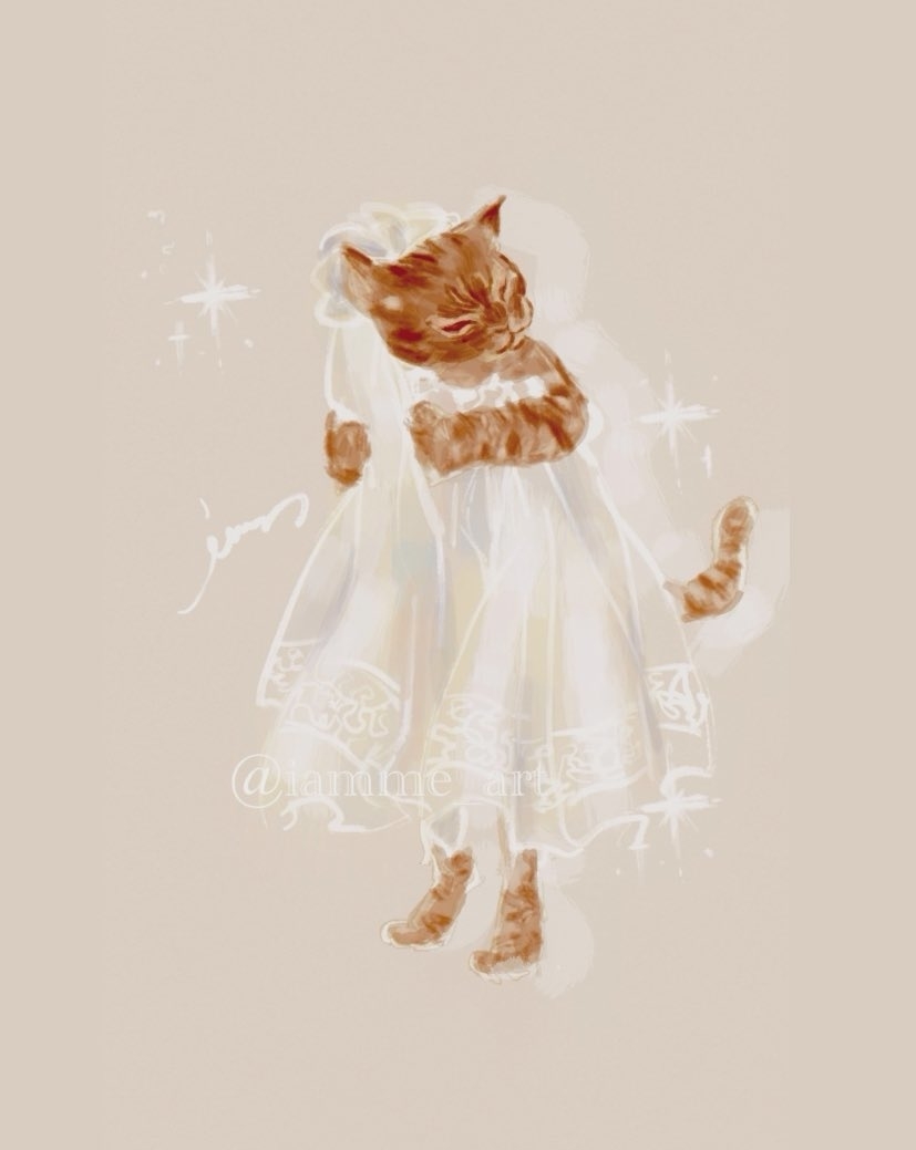 猫が可愛らしいドレスを着て、ベールをかぶった花嫁のように描かれています。