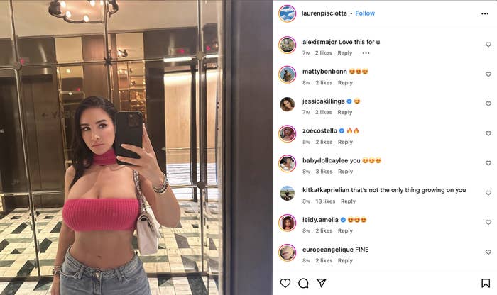 Lauren Pisciotta poses in a mirror selfie, wearing a cropped top and jeans. Comments from her Instagram followers are visible on the right