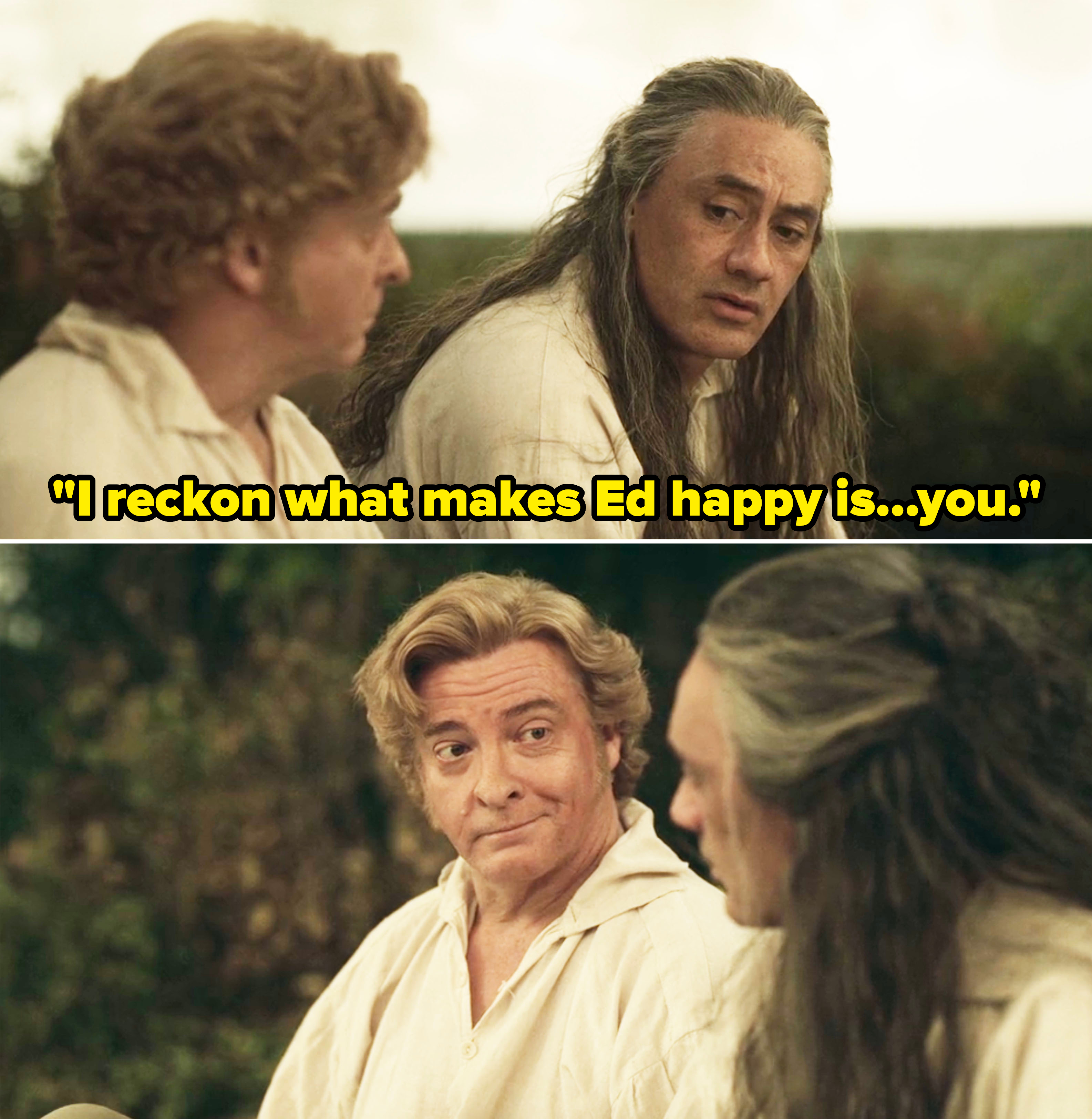 Rhys Darby and Taika Waititi in historical clothing, sitting and talking in an outdoor setting