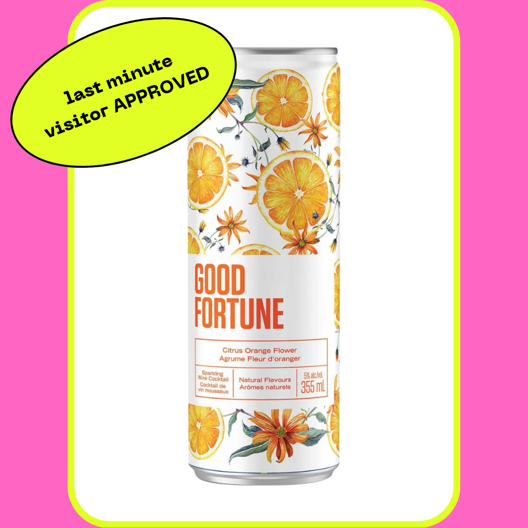 Good Fortune citrus orange flower drink can with floral design. A green oval with "last minute visitor APPROVED" in black text is in the top left corner