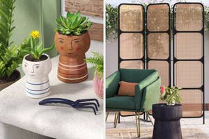 Three plant pots shaped like heads, one with yellow flowers and two with succulents, next to a green armchair and a wooden screen in a living space