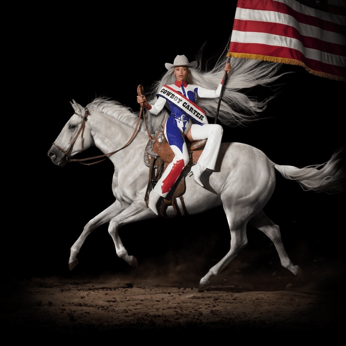 Lady Gaga riding a white horse, dressed in a red, white, and blue outfit with &quot;Porter on Cartier&quot; adorned across the chest, holding an American flag