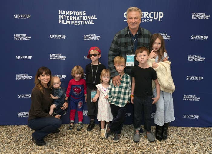 Alec Baldwin with his wife Hilaria Baldwin and their seven children pose for a group photo at the Hamptons International Film Festival