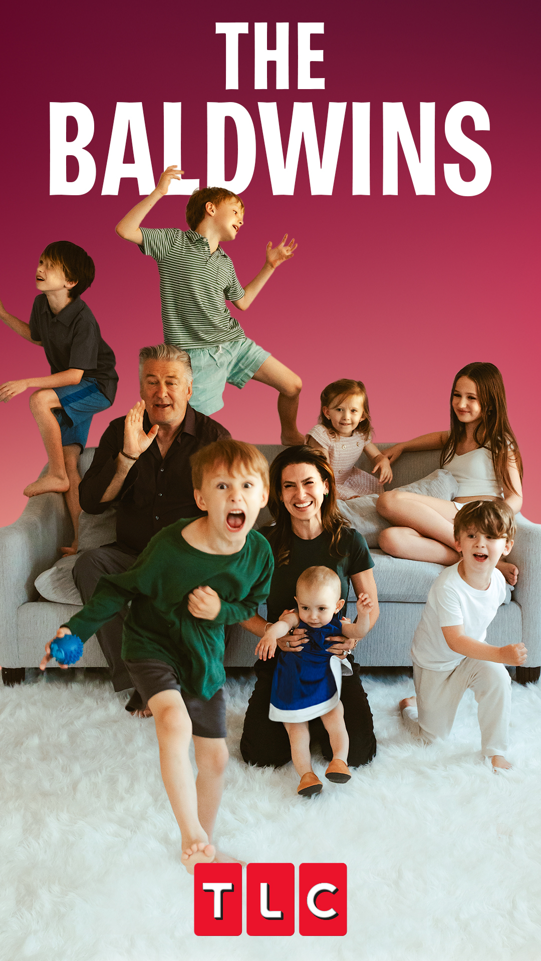 Alec and Hilaria Baldwin, with their seven children, pose playfully in a living room. The text reads "THE BALDWINS" and "TLC"