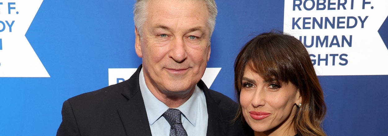 Alec Baldwin and Hilaria Baldwin pose together at the Robert F. Kennedy Human Rights event. Alec is in a suit and tie, while Hilaria wears an elegant dress