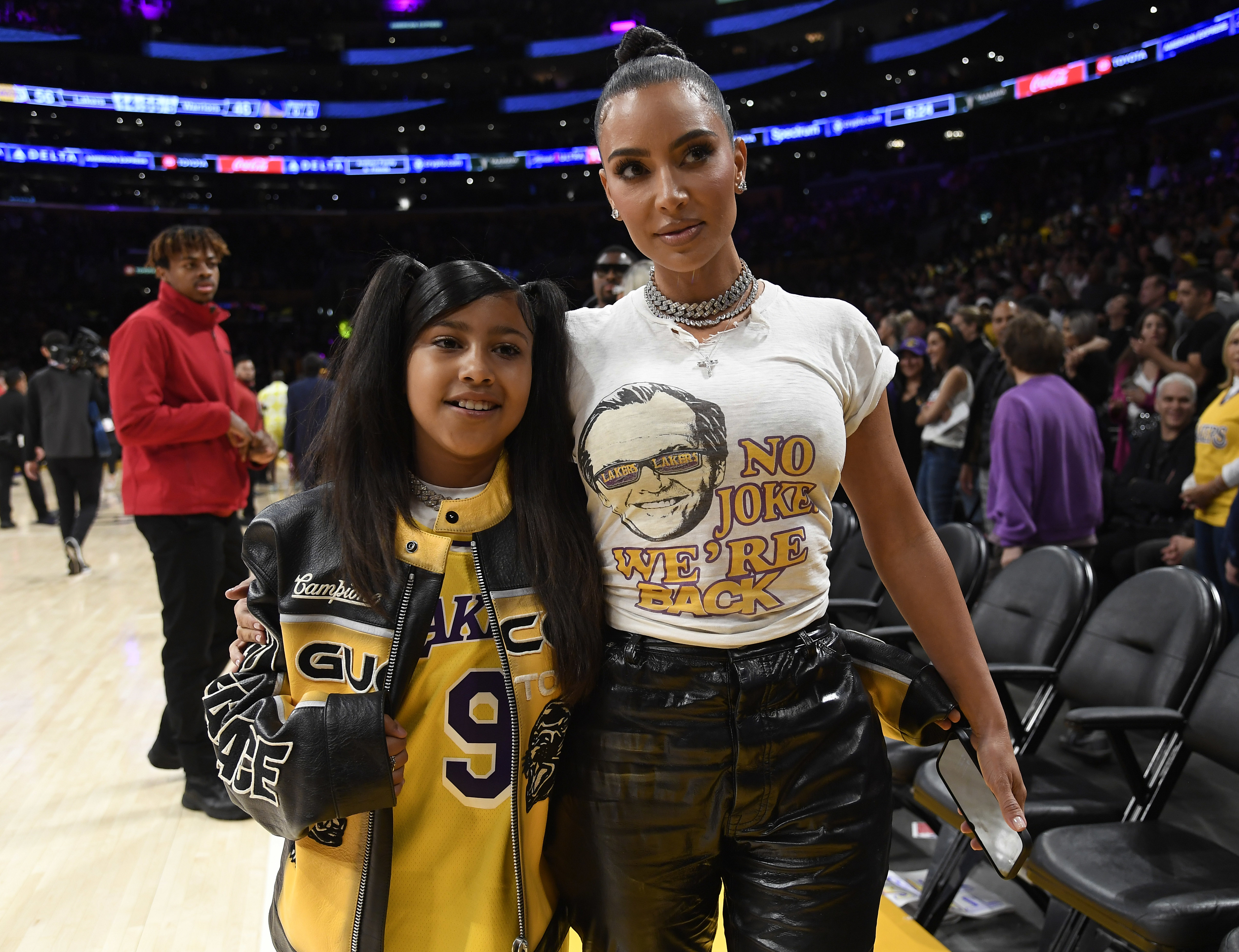 Kim Kardashian and North West at a basketball game