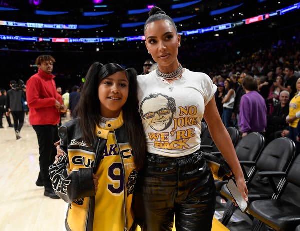 Kim Kardashian and North West at a basketball game