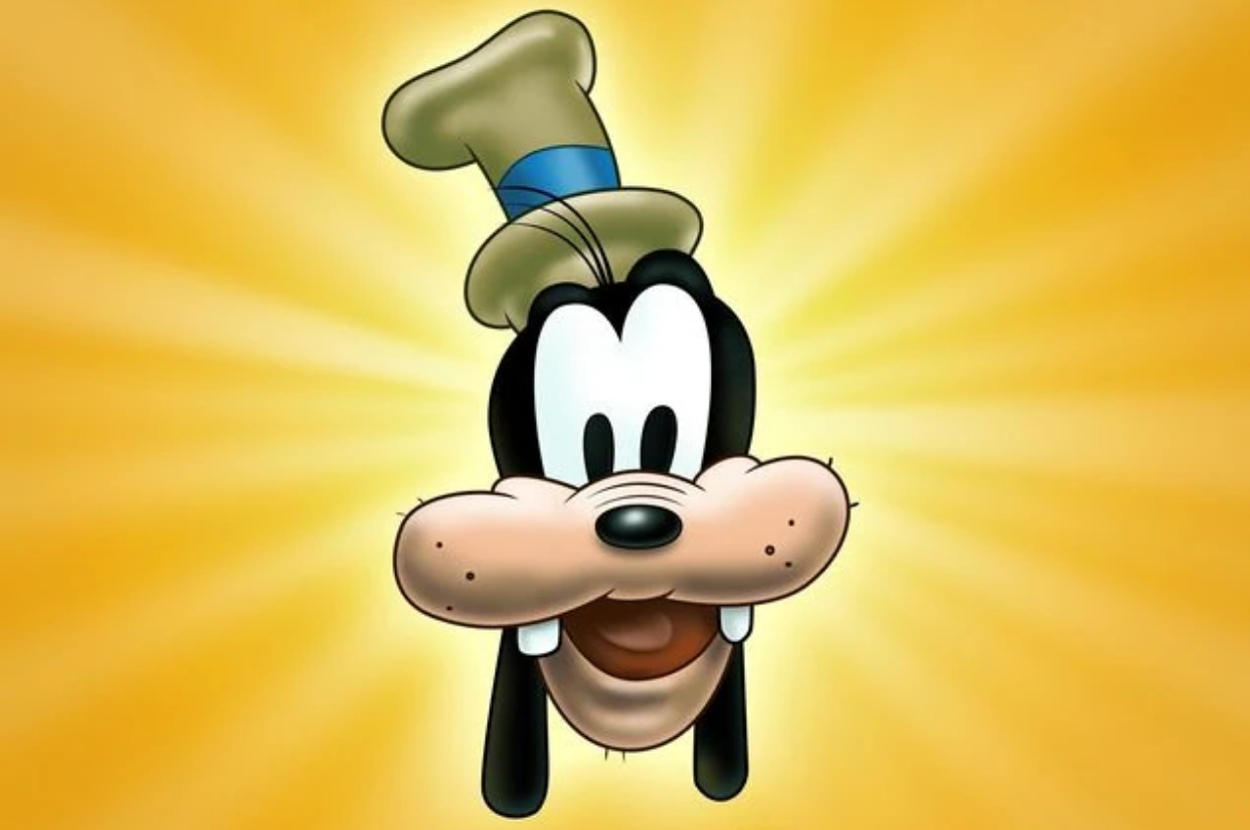 Goofy, Disney cartoon character, smiling with his classic hat on, against a bright background