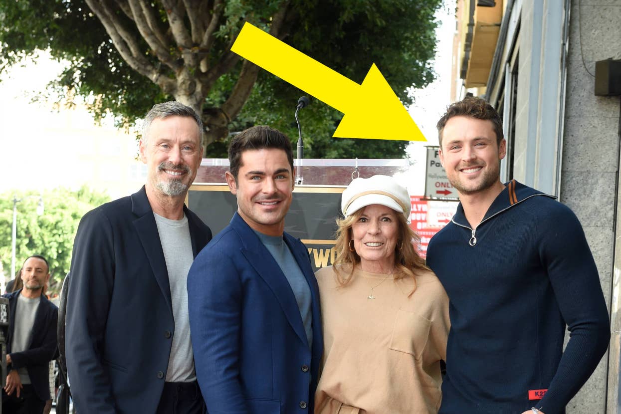 Group photo of Denis Coleman, Zac Efron, Starla Baskett, and Thad Luckinbill at an outdoor event. Yellow arrow points to Thad Luckinbill