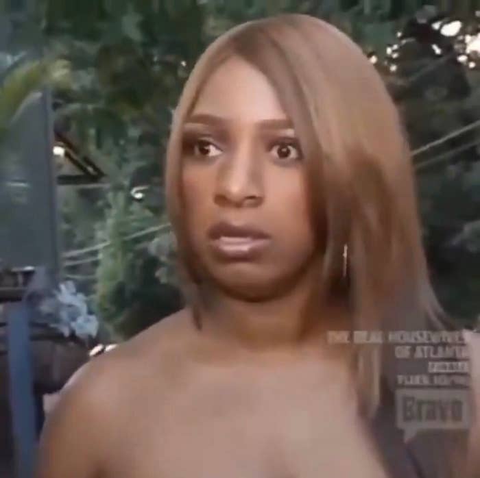 NeNe Leakes from "The Real Housewives of Atlanta" looks surprised in an outdoor setting