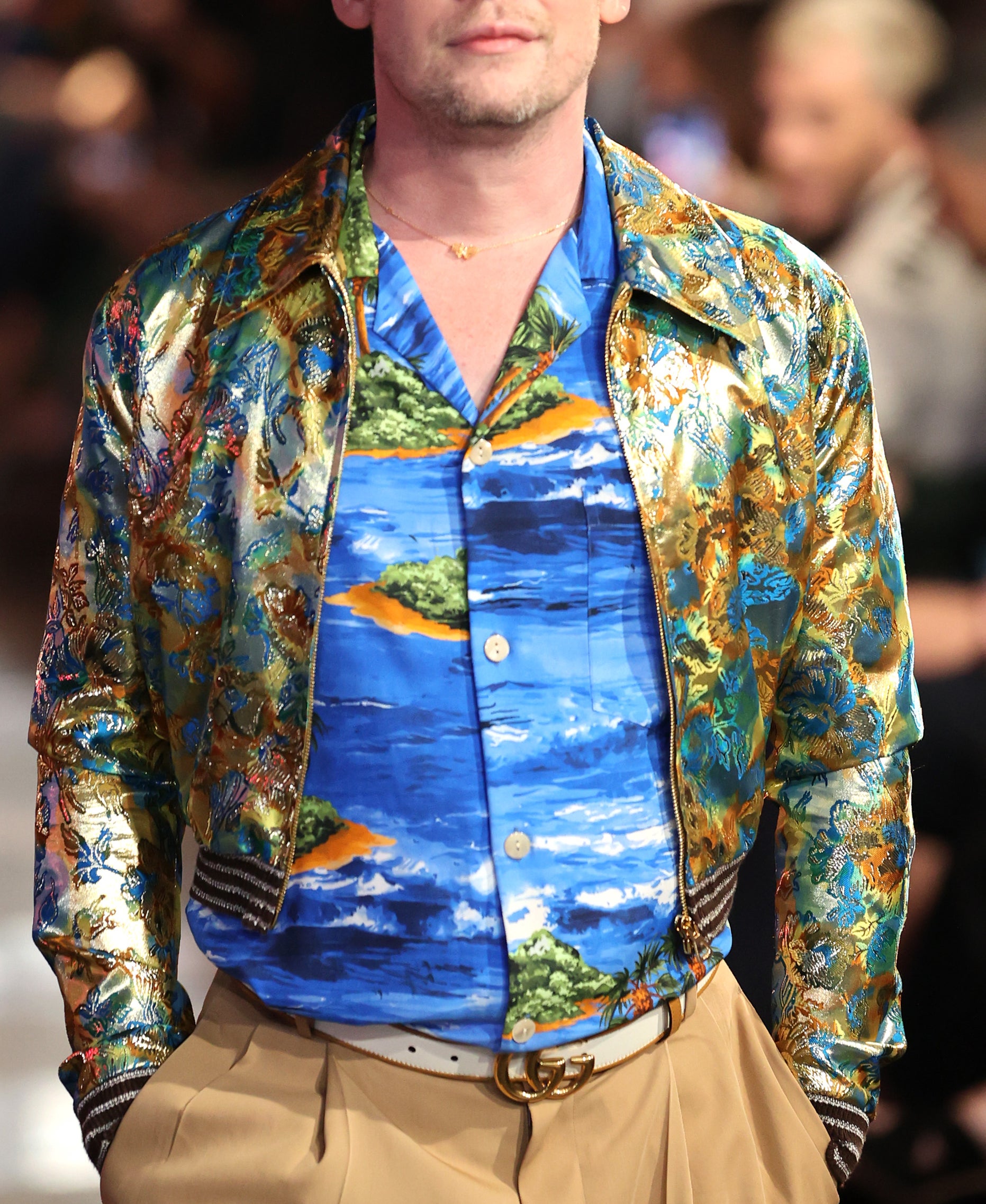 Macaulay Culkin wearing a patterned bomber jacket